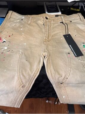 Rockstar Original Men’s Tan Slim Jeans with Paint-Splatter Detail